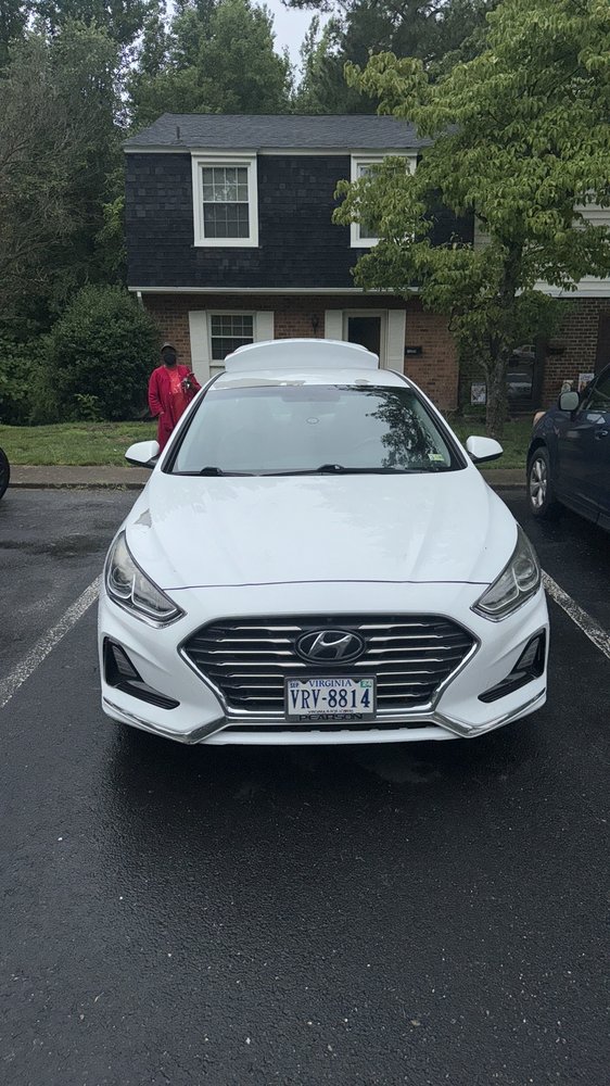 White Hyundai Sonata helped in a parking lot during a Richmond roadside assistance call